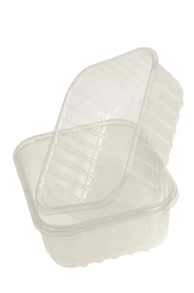 透明塑料食品盘紧密贴在白色背景上 — 图库照片