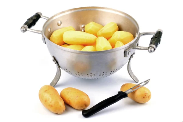 Colander Potatoes Vegetable Peeler Close White Background — Stock Photo, Image