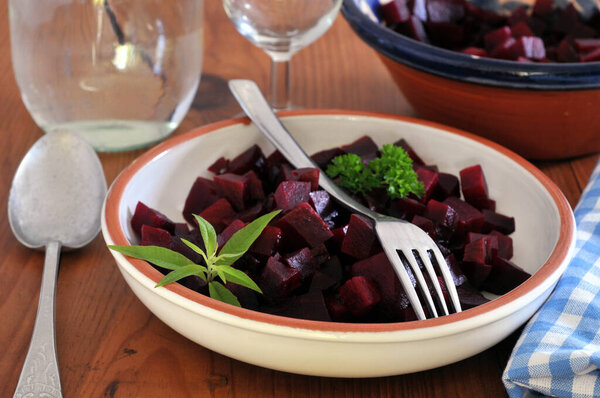 Plate of beets cut into cubes close-up