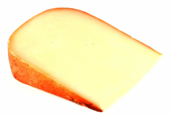羊のチーズ白い背景にクローズアップ — ストック写真