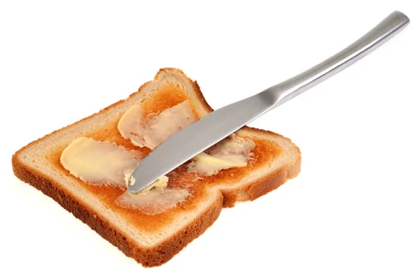Kawałek Miękkiego Chleba Masłem Nożem Zbliżenie Białym Tle — Zdjęcie stockowe
