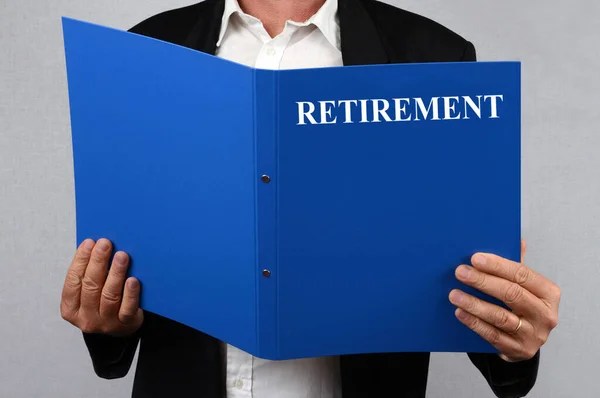 Man Holding Retirement Folder — Stock Photo, Image