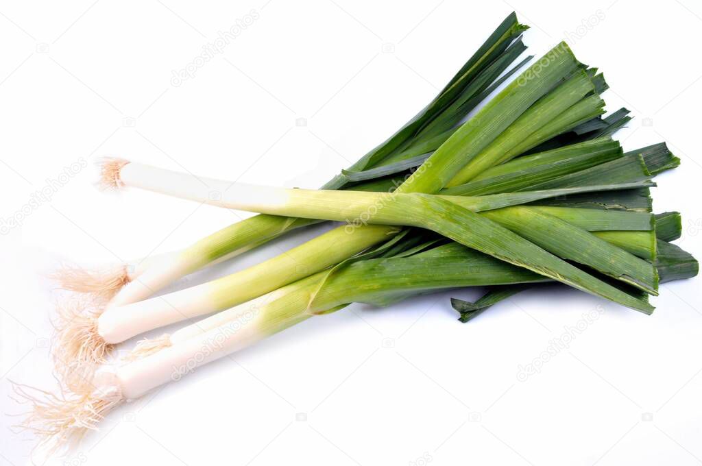Bunch of leeks close-up on a white background