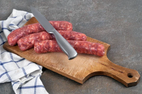 Raw Sausages Knife Cutting Board — Stock Photo, Image