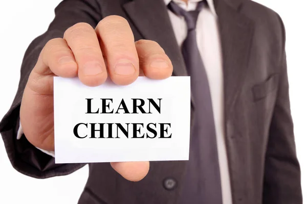 Muž Držící Kartu Které Napsáno Učit Čínsky — Stock fotografie