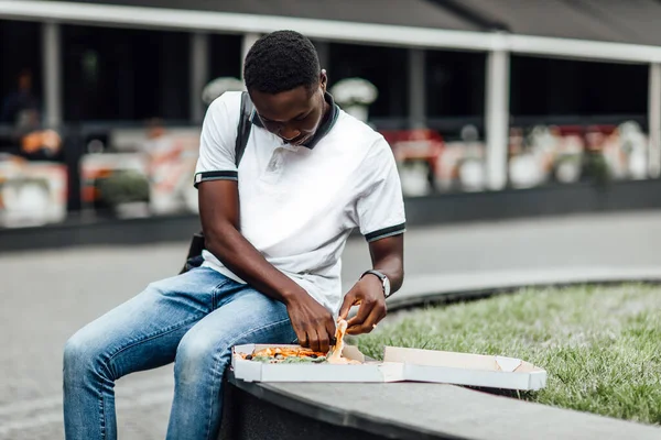 Handsome Young African Man Tourist Eating Slice Pizza Street Food — Stock Photo, Image