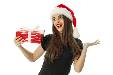 çekici kız Noel Baba şapkası kırmızı hediye ile gülümseyen