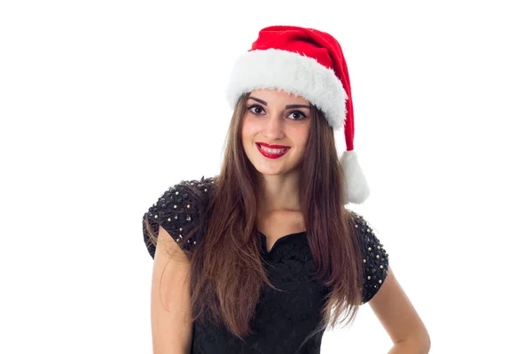 Flicka i santa hatt leende — Stockfoto