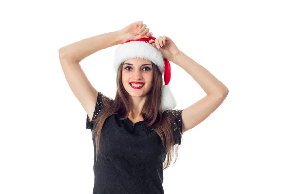 Beauty young girl in santa hat — Stockfoto