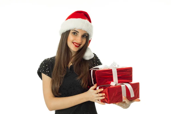 Beauty Woman in santa hat with red gift — Stock Photo, Image