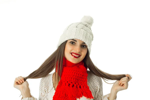 Brunette girl in warm sweater and red scarf — Stock Photo, Image