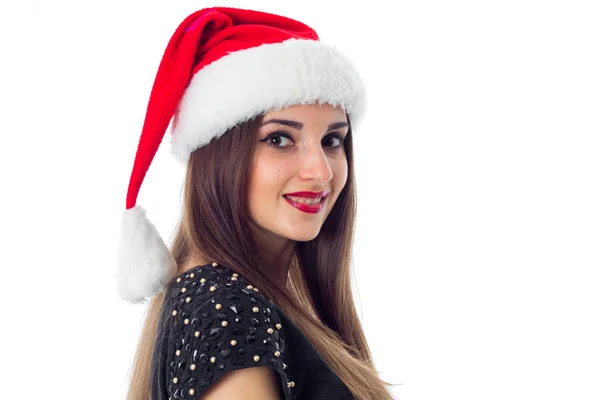 Porträtt av brunett tjej i santa hatt — Stockfoto