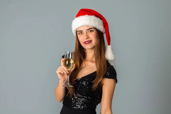 Schoonheid vrouw in Kerstman hoed — Stockfoto