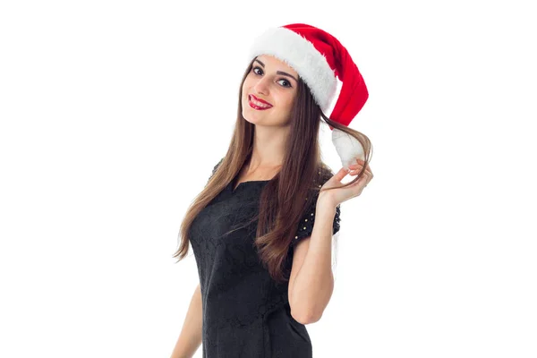 Giovane ragazza bruna in cappello di Santa — Foto Stock