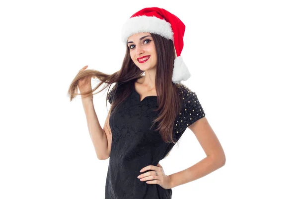 Brunette girl in santa hat — Stock Photo, Image