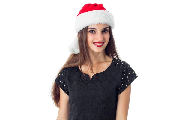 可爱的女孩，在圣诞老人的帽子 — 图库照片
