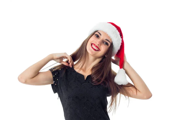 Charming girl in santa hat — Stock Photo, Image