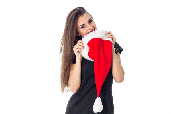 Ragazza allegra in cappello di Babbo Natale — Foto Stock