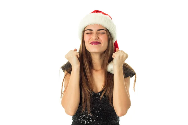 Ritratto di felice ragazza attraente in cappello di Babbo Natale — Foto Stock