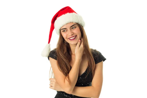 Felice ragazza in cappello di Babbo Natale — Foto Stock