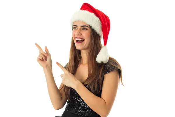 Ritratto di ragazza allegra in cappello di Babbo Natale — Foto Stock