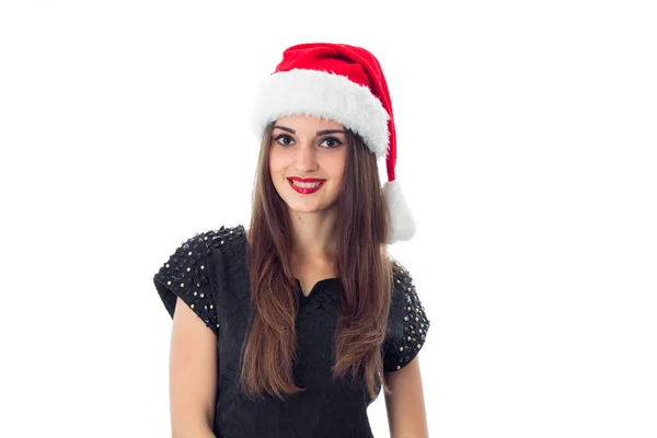 Attraktive Brünette Mädchen mit Weihnachtsmütze — Stockfoto