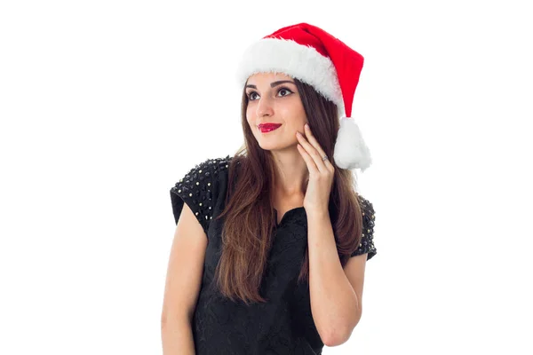 Charmante fille brune en chapeau de Père Noël — Photo