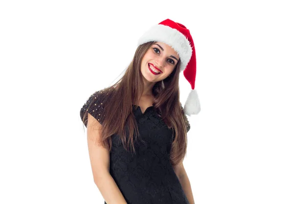 Charming young girl in santa hat — Stock Photo, Image