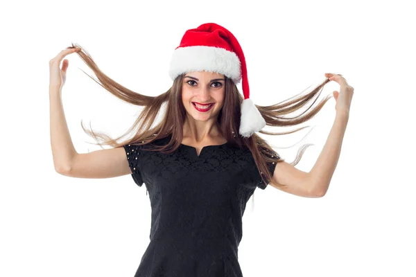 Girl in santa hat smiling — Stock Photo, Image