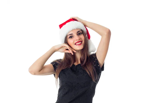 Attraente ragazza in cappello di Babbo Natale — Foto Stock