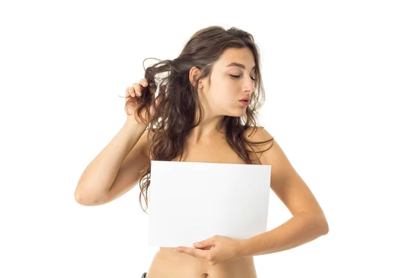 Nude brunette girl with placard — Stock Photo, Image