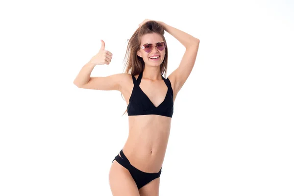 Girl in black swimsuit — Stock Photo, Image
