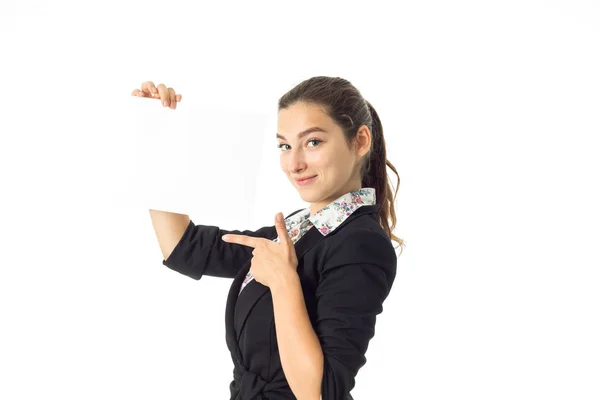 Frau in Uniform mit weißem Plakat in der Hand — Stockfoto