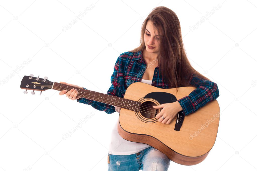 beautiful brunette woman with guitar