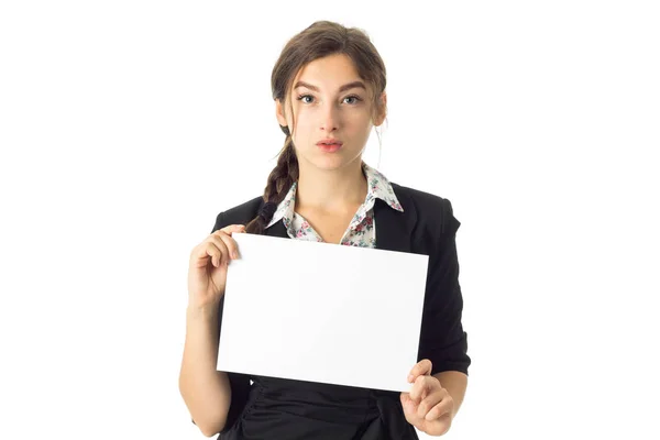 Woman in uniform with white placard in hands — Stock Photo, Image