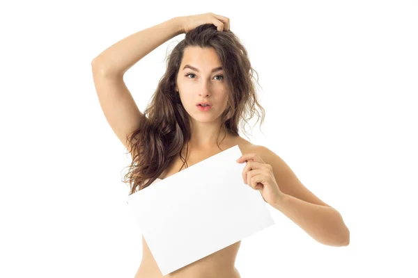 Nude brunette girl with placard — Stock Photo, Image