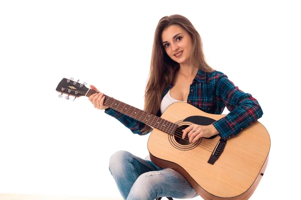 Menina sexy com guitarra sorrindo — Fotografia de Stock