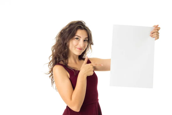 Girl in red dress with white placard — Stock Photo, Image