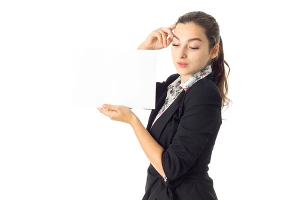 Woman in uniform with white placard in hands — Stock Photo, Image