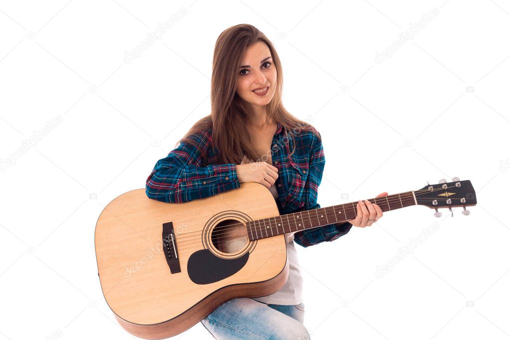 girl with guitar in hands 