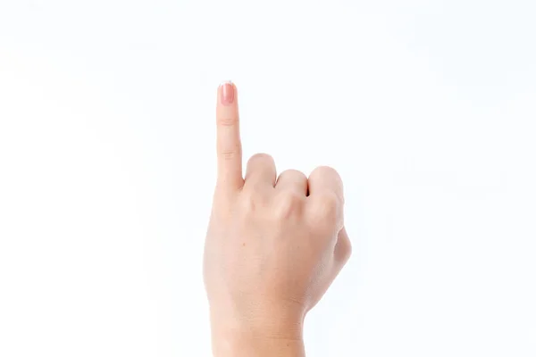 Mão feminina mostrando o gesto com levantou o dedo mindinho — Fotografia de Stock