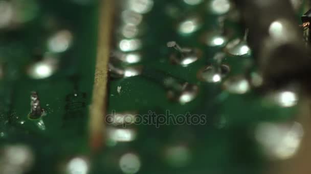 Guy wires are soldered to the chip Macro — Stock Video