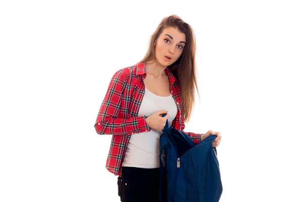 Fiatal diák lány meglepett hátizsák jelentő elszigetelt fehér background stúdió — Stock Fotó