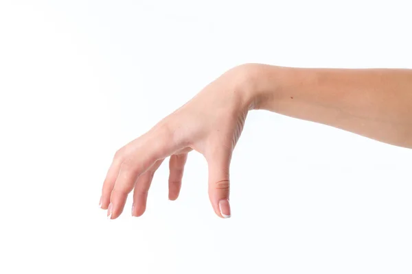 Mão feminina mostrando o gesto com a palma para baixo e dedos espaçados — Fotografia de Stock