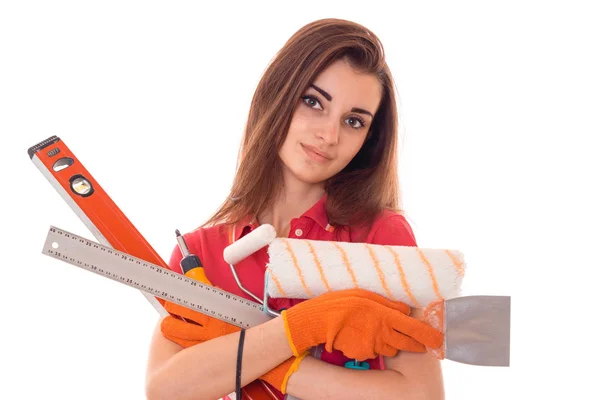 Bonita dama morena hace remodelar un apartamento aislado sobre fondo blanco en estudio — Foto de Stock