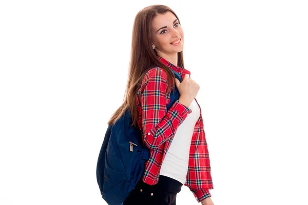 Cheerful young student girl with backpack looking away and smiling isolated on white background. student years concept. study concept. — Stock Photo, Image