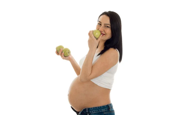 Beautiful pregnant future mother with green apples hands smiling on camera isolated on white background — Stock Photo, Image