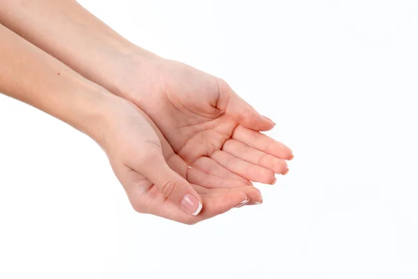 Zwei weibliche Hände ausgestreckte Handflächen vereinzelt auf weißem Hintergrund — Stockfoto