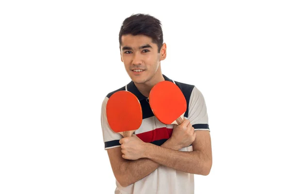 Bastante joven deportista jugando ping-pong sonriendo en cámara aislada sobre fondo blanco — Foto de Stock