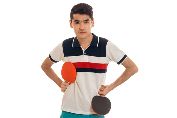 Ernsthafter junger Sportler spielt Ping-Pong isoliert auf weißem Hintergrund — Stockfoto